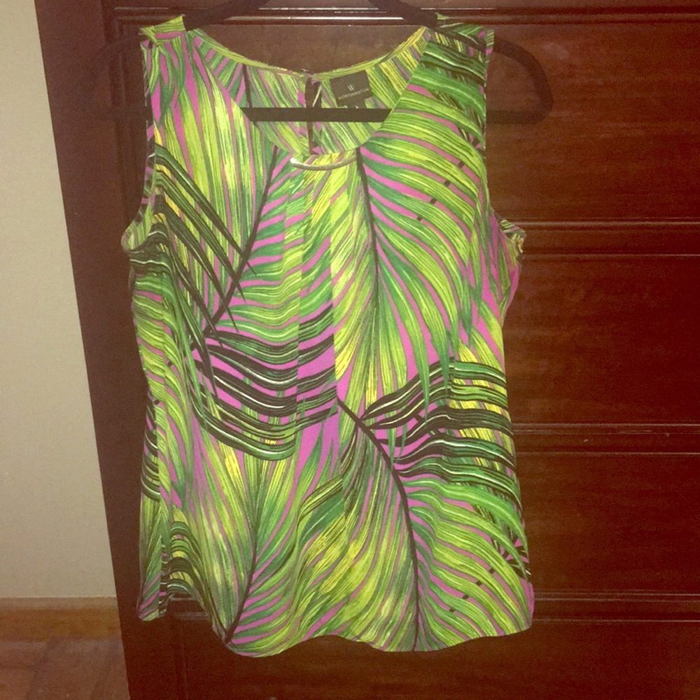 Sleeveless Blouse with button/slit back closure.
